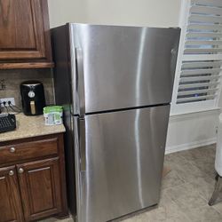 GE 21.9 cu ft Garage Ready Refrigerator, Stainless. Model GTS22KYNCRFS - Almost 2 Years Old