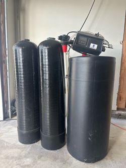 Excellent condition full system water softener with all the parts and manual - disconnected and ready for pick up!