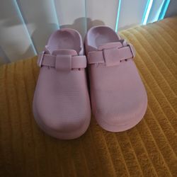 

The item in the image is a pair of Birkenstock Boston EVA clogs, in the fondant pink colorway Size 8