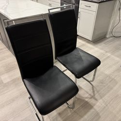 4 dining room chairs  black with silver trim