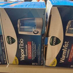 Three Vicks WarmMist Humidifiers