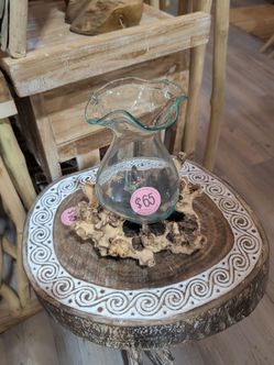 Glass terrarium on a wooden stand