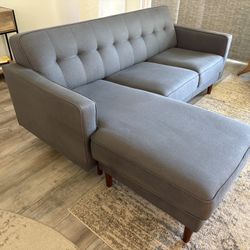 Living Spaces Couch With Reversible Chase Grey