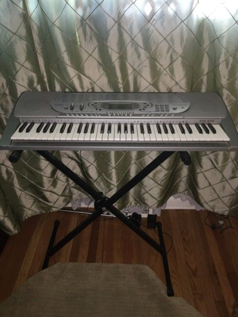 Casio CTK 574 Touch Sensitive Personal Keyboard Musical Instrument Piano with Stand