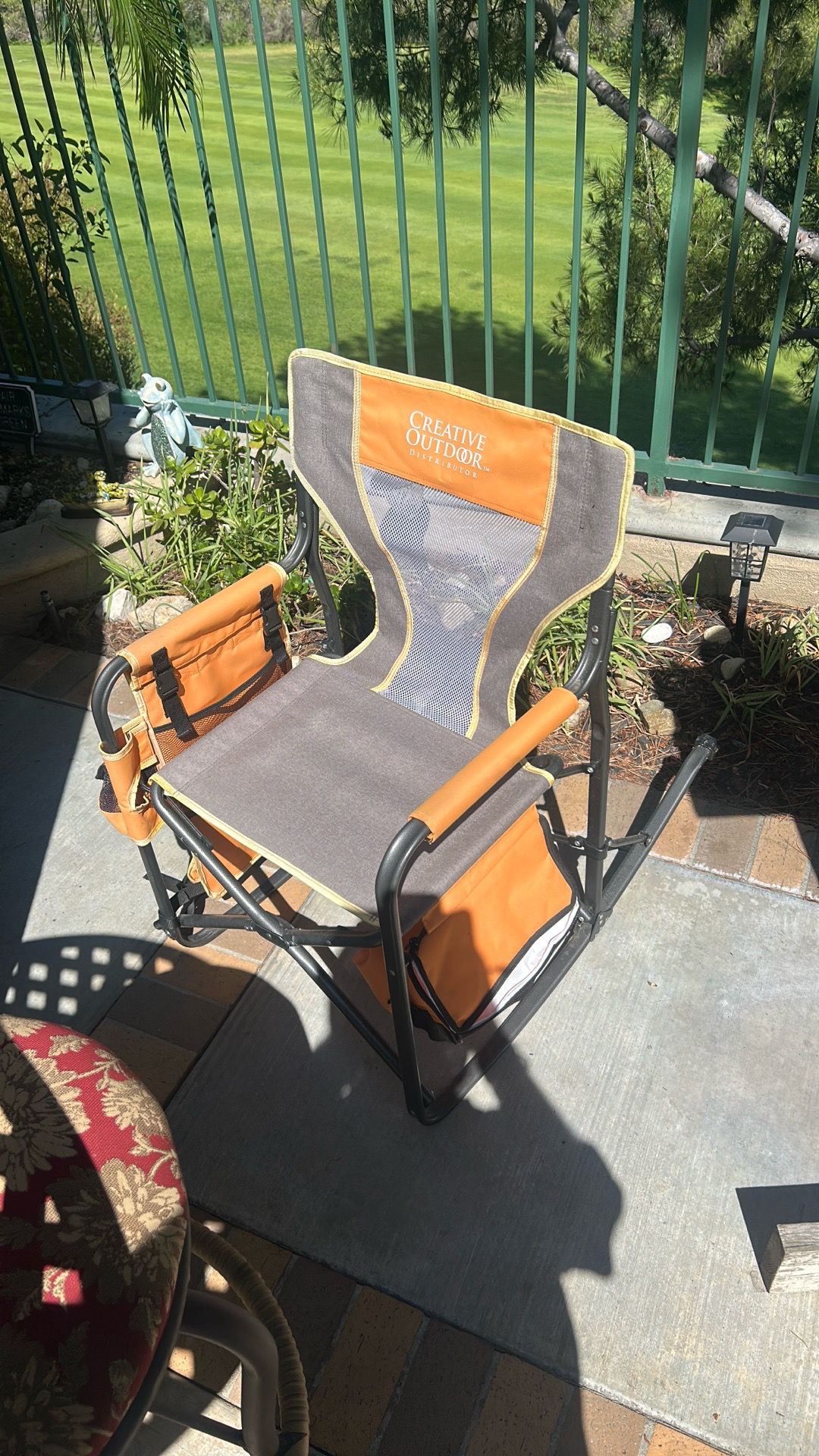 Orange outdoor portable rocking chair