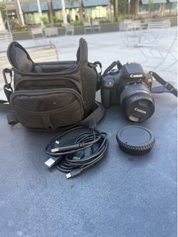 Canon T-100