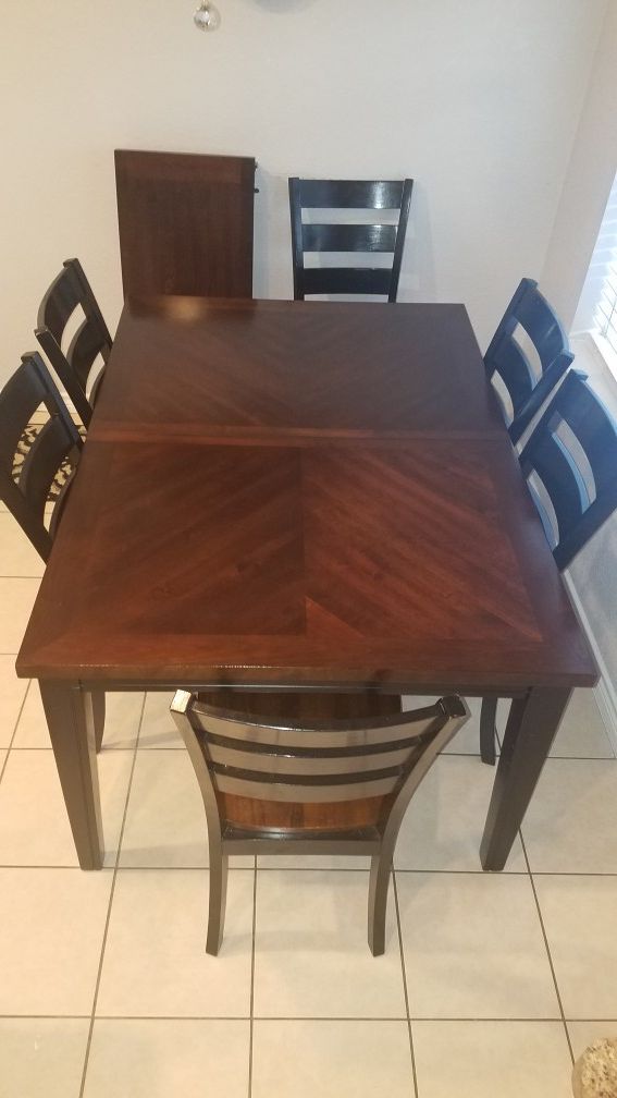 Black and brown kitchen table and chairs