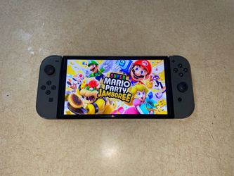 NINTENDO SWITCH OLED MOD + 7000 GAMES INSTALLED