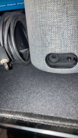 gray fabric Amazon Echo (2nd Generation) smart speaker with Alexa.