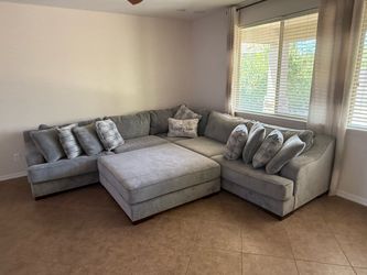 Large 3 piece sofa and ottoman in smoke grey
