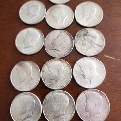 1964 Kennedy half dollar silver.
