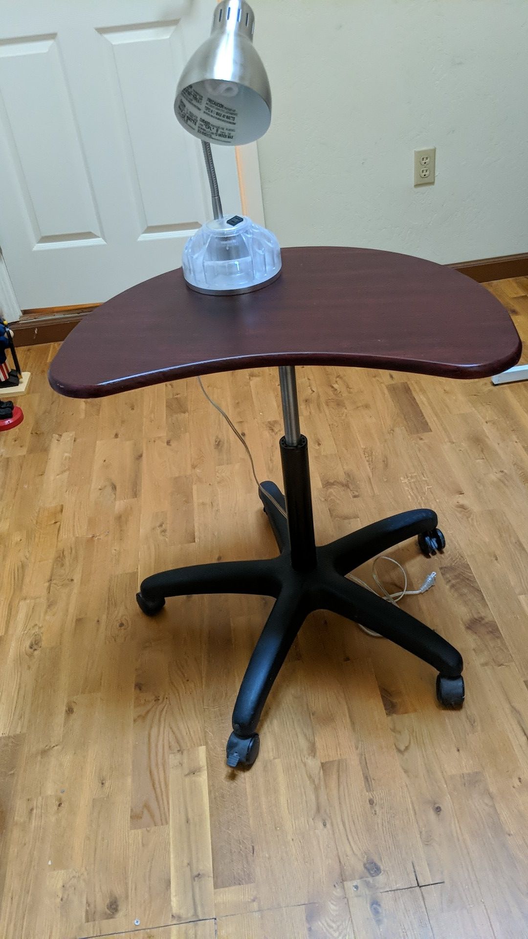 Small desk table. Adjustable in hight.