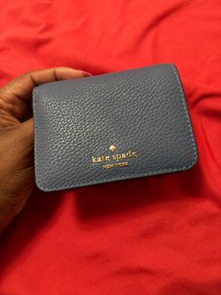 Kate Spade New York blue leather wallet with pebbled texture