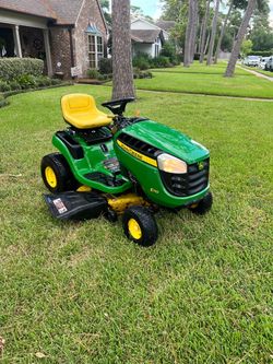 John Deere riding lawnmower