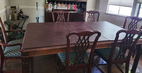 Chippendale style mahogany dining table and chairs