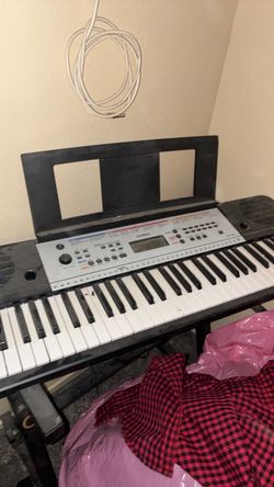 Yamaha Electronic Keyboard with Music Stand