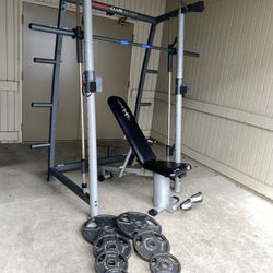 Smith Machine Weight Bench And Weights 