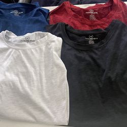 Set of 4 Real Essentials long sleeve T-Shirts in various colors, size S.