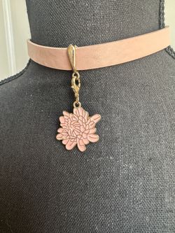 Pink choker with flower charm