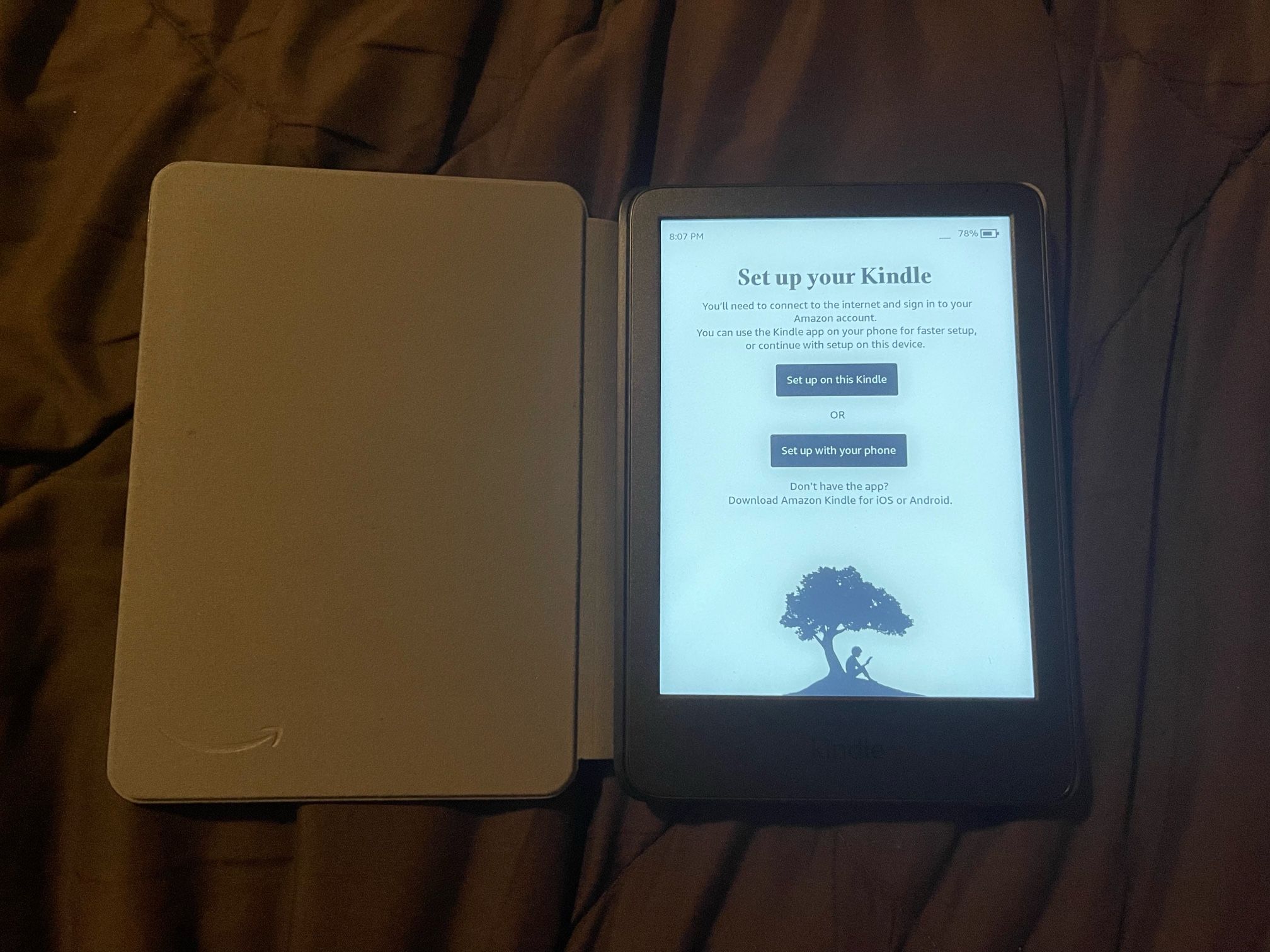 Amazon Kindle 16 GB (newest model), with original Amazon cover