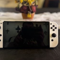 Nintendo switch oled bundle adult Owned  Price Negotiable 