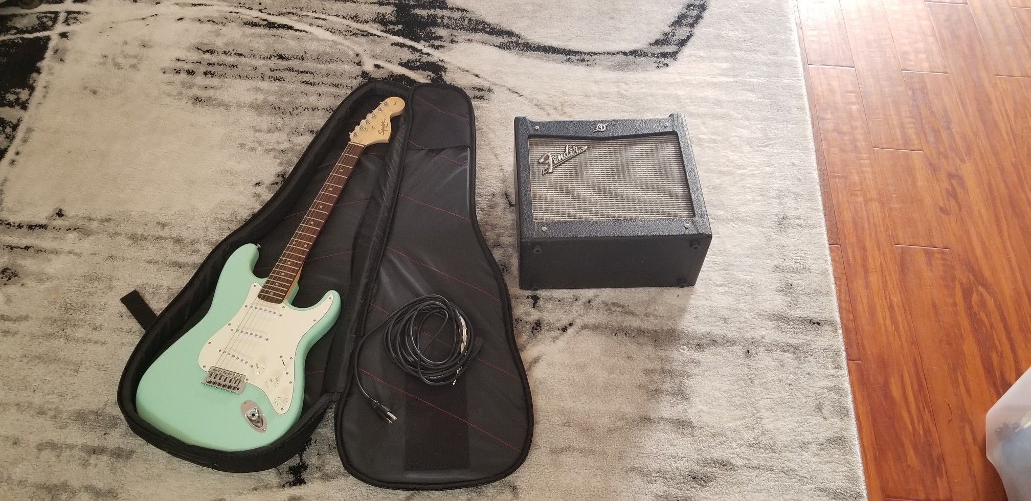 Electric guitar with amplifier