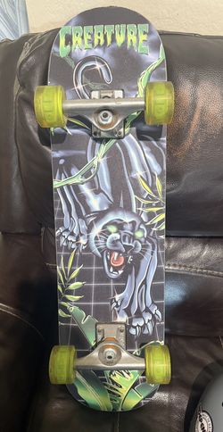 Creature Skateboard With Helmet