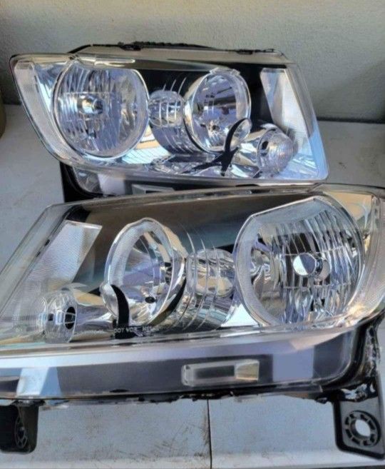 11-13 Jeep Grand Cherokee Headlights LUCES MICAS FAROS Calaveras Focos