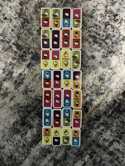 Sanrio Hello Kitty Dominoes - 28 High-Quality Dominoes in Decorative Tin