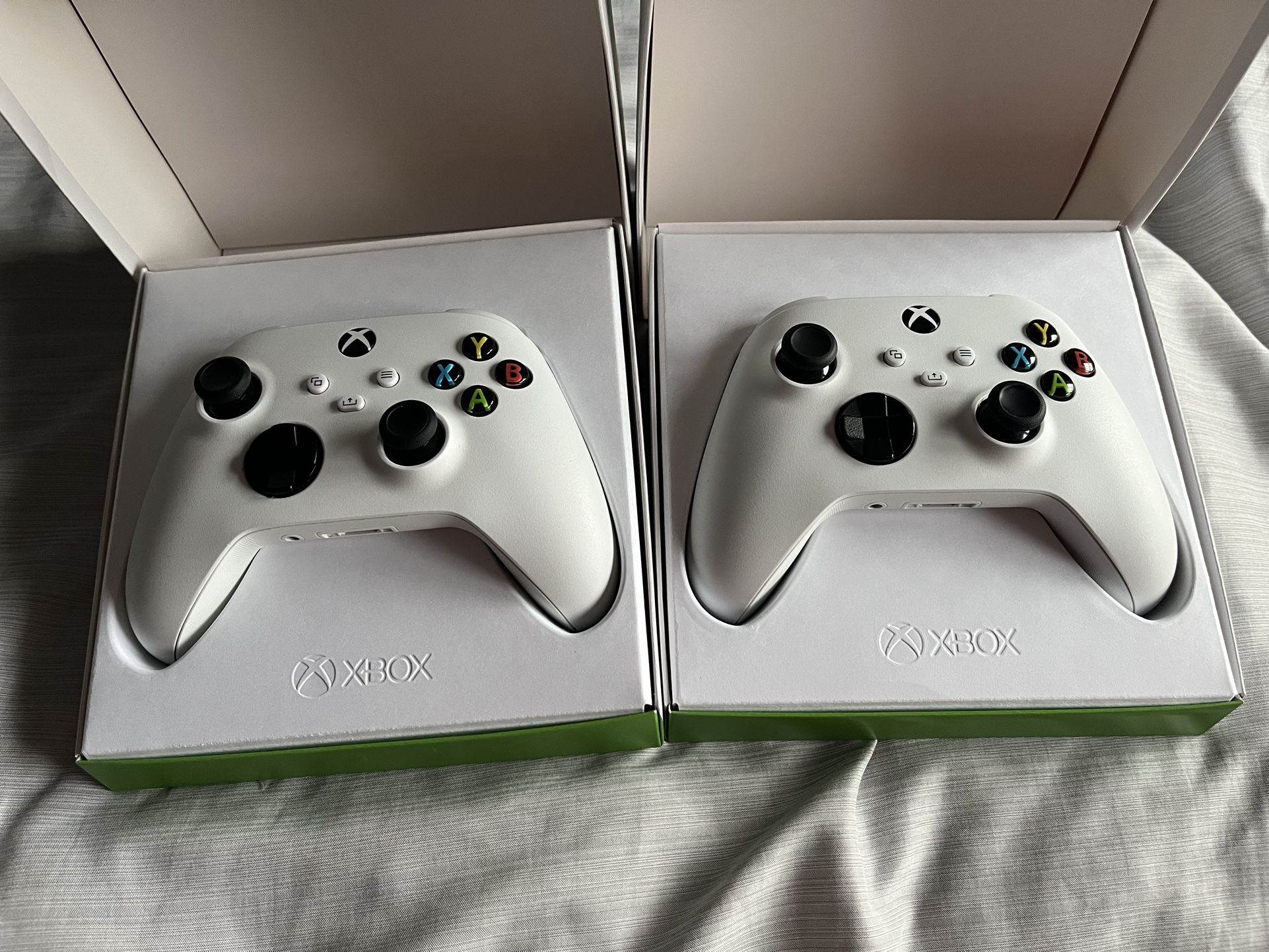 2 Xbox Robot White Controllers