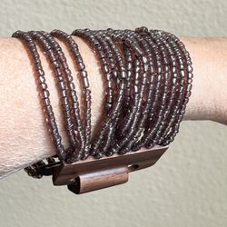 Funky purple beaded bracelet with large wooden clasp