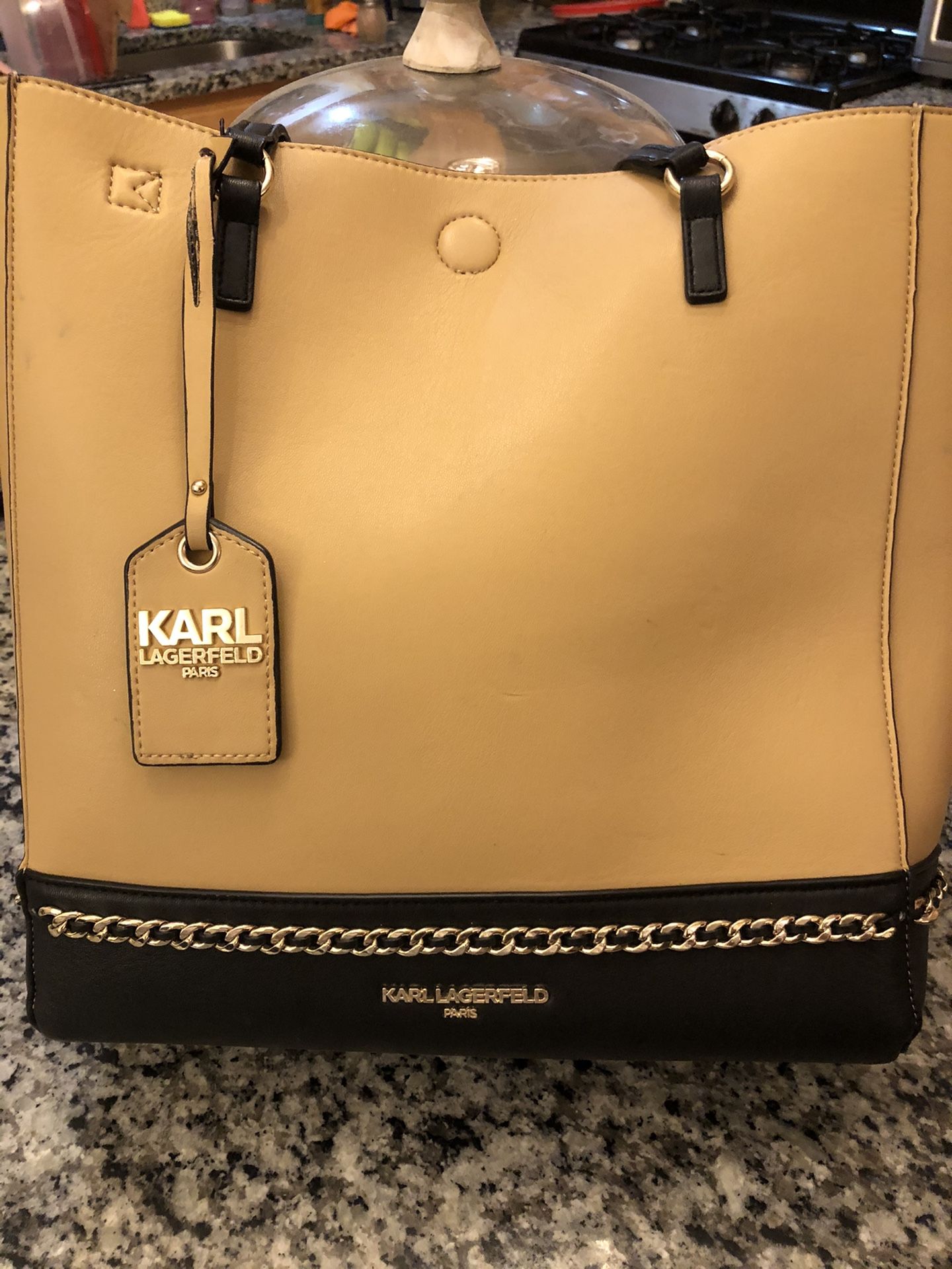 Karl Lagerfield never full bag with large wallet