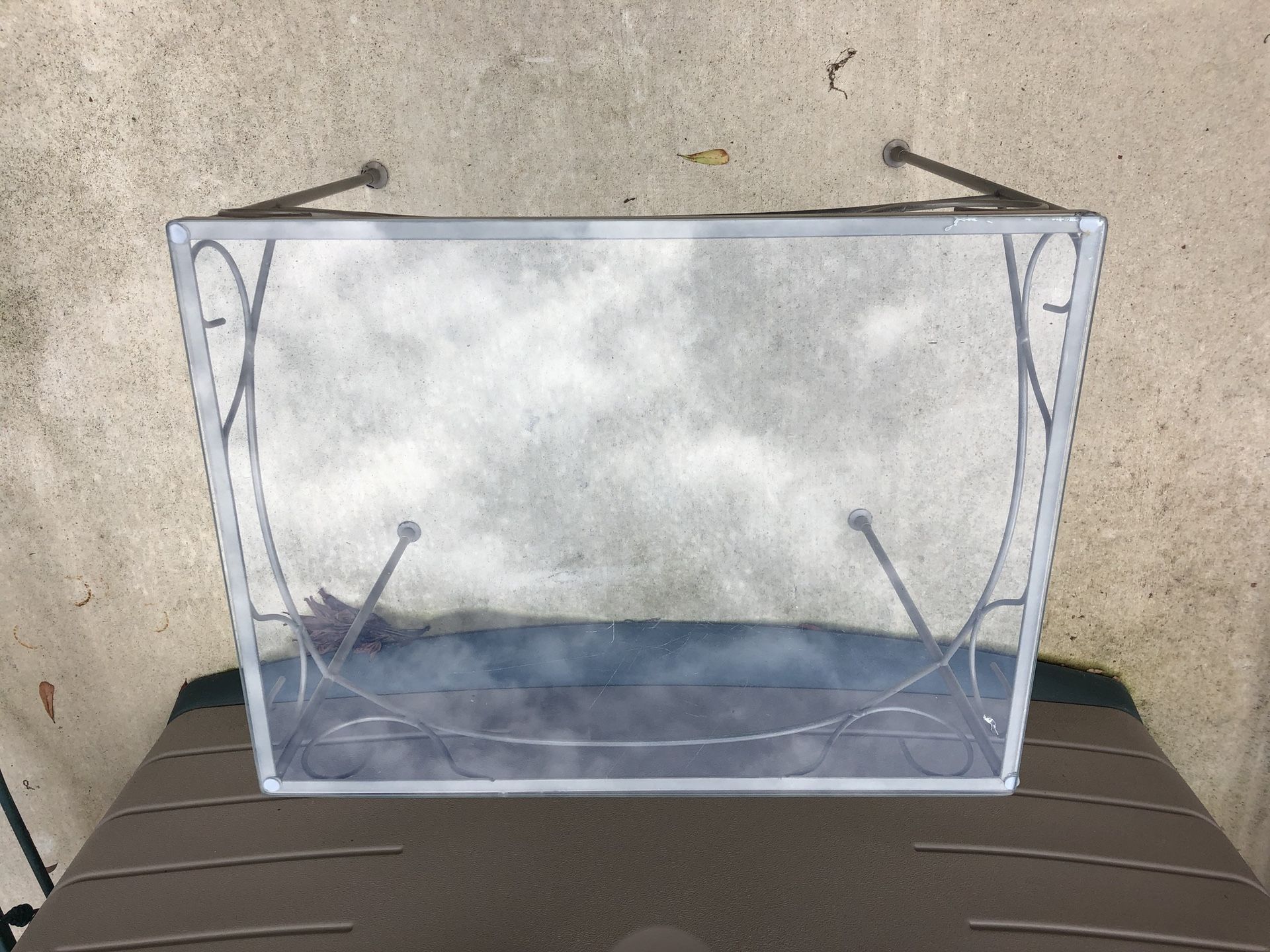 Small metal glass top side table