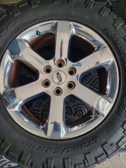 OEM Ford F150 2016 20in Chrome wheels an Nitto Ridge Grappler tires