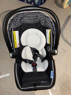 Newborn car seat with stroller attachment