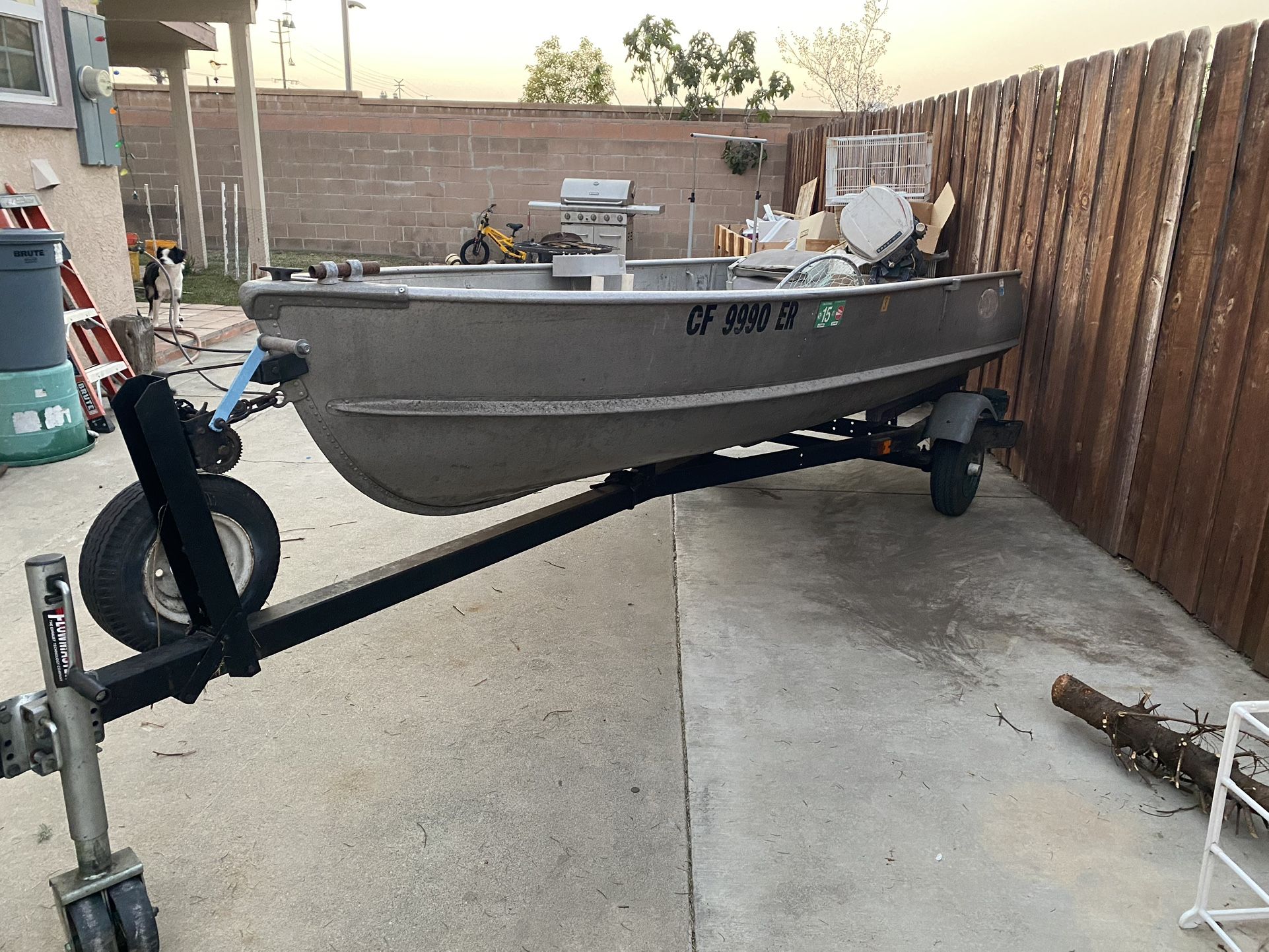 12ft Alumacraft Boat & Trailer.