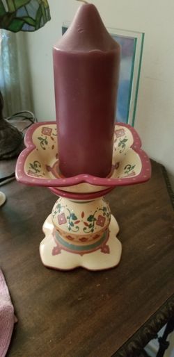 Candle holder with candle