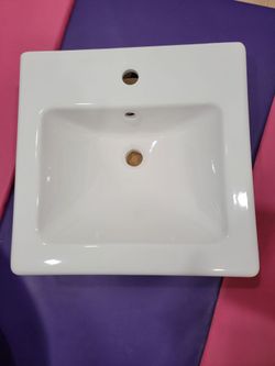 Bathroom sink and cabinet