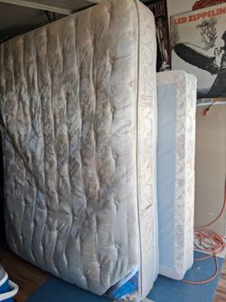 Queen size mattress and boxspring and two sets of sheets