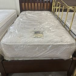 Twin size mattress, and boxspring and bed free delivery