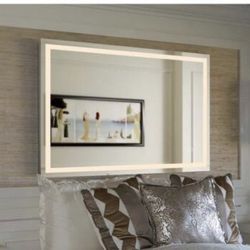 Innoci‑USA Terra 56 in. W × 36 in. H frameless rectangular LED light bathroom vanity mirror. 
