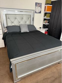 Queen size bed frame with light back