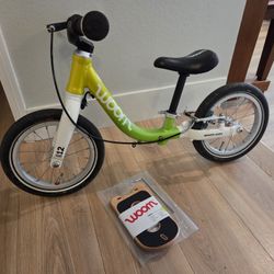 Woom 1 Balance Bike with Surfboard