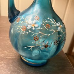 I’m not sure but I’m gonna call it an antique perfume bottle