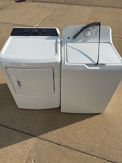 Media electric dryer and GE top load washer.
