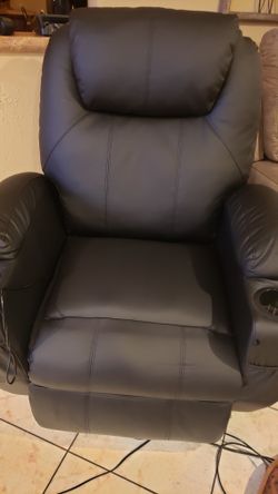 One Brown Fabric Recliner And One Black Leather Electric Recliner