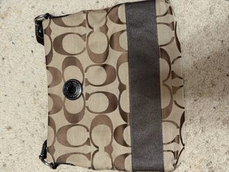 Coach brown canvas crossbody bag