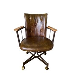 1960’s Mid Century Douglas Faux Leather Swivel Chair