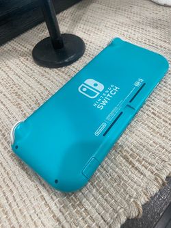 Nintendo switch lite teal almost mint condition