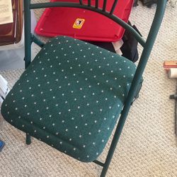 Two Matching Green Chairs